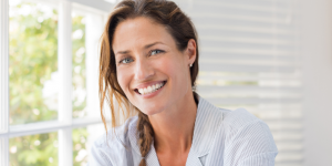 Midlife Woman adding passive income to her business